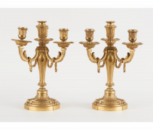 Paire de candélabres en bronze doré à quatre bras signées sur la base Bonnefond