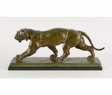 Sculpture en bronze représentant un tigre en mouvement signée Raymond De Meester
